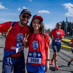 Familias disfrutando el día de carrera Bimbo Global Race 2026
