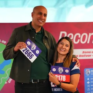 Personas preparándose para correr en la Bimbo Global Race en la Bimbo Global Race 2026