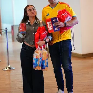 Participantes de la carrera viviendo la entrega de kits en la Bimbo Global Race 2026