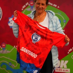 Familias participantes recogiendo su kit de participante en la Bimbo Global Race 2026