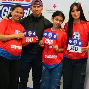 Visitantes viviendo la entrega de kits en la Bimbo Global Race 2026